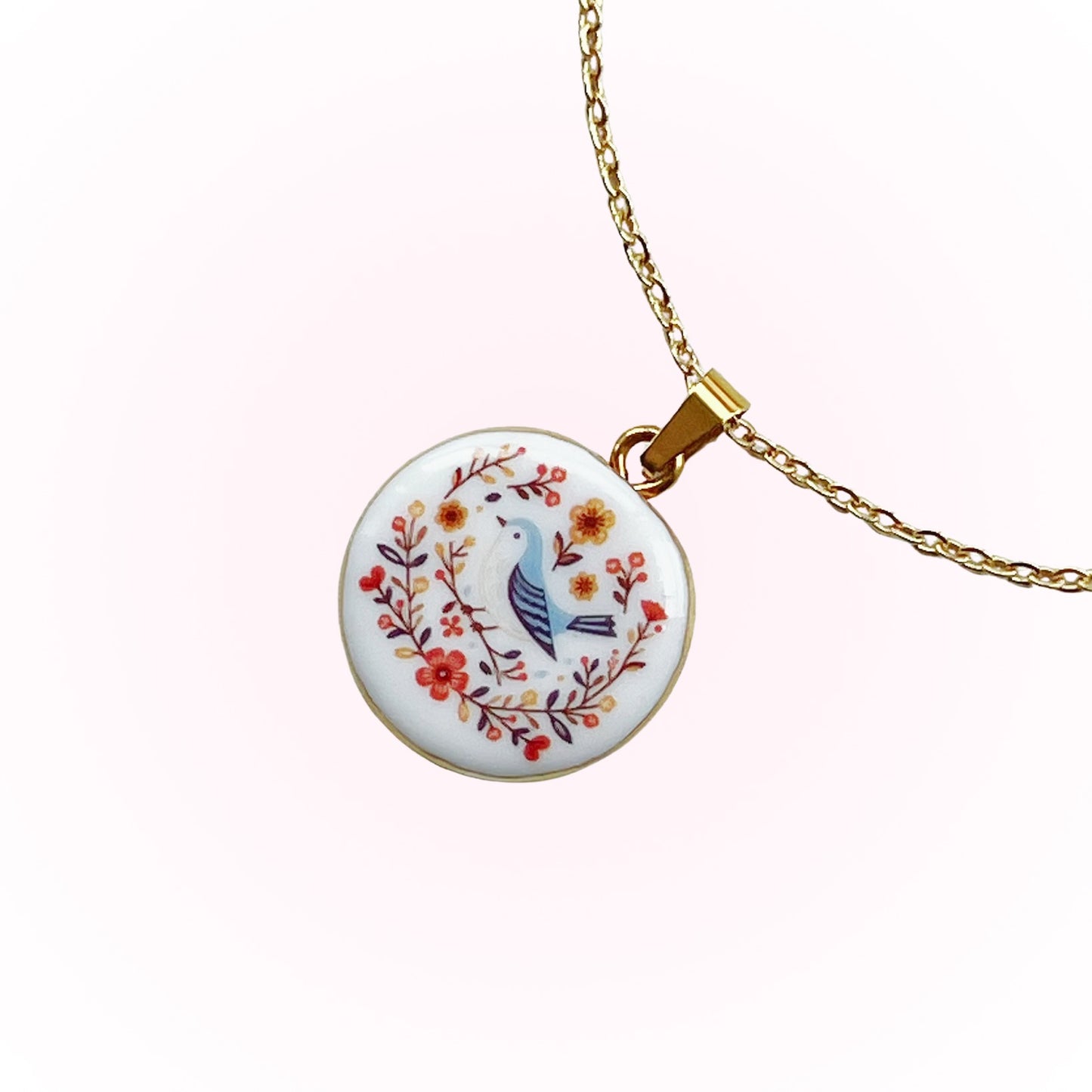 Blue bird and flowers necklace
