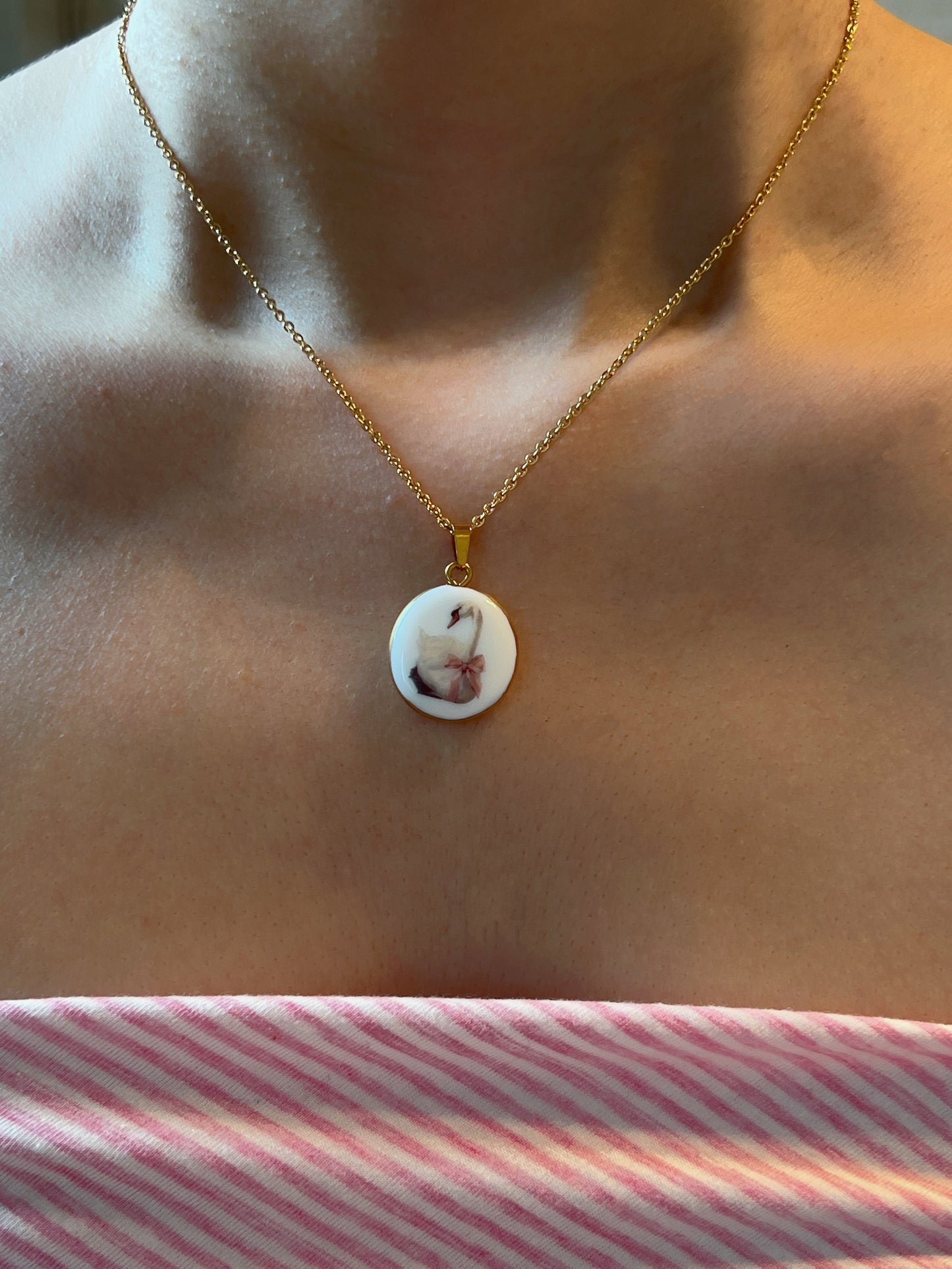 Swan with pink bow necklace
