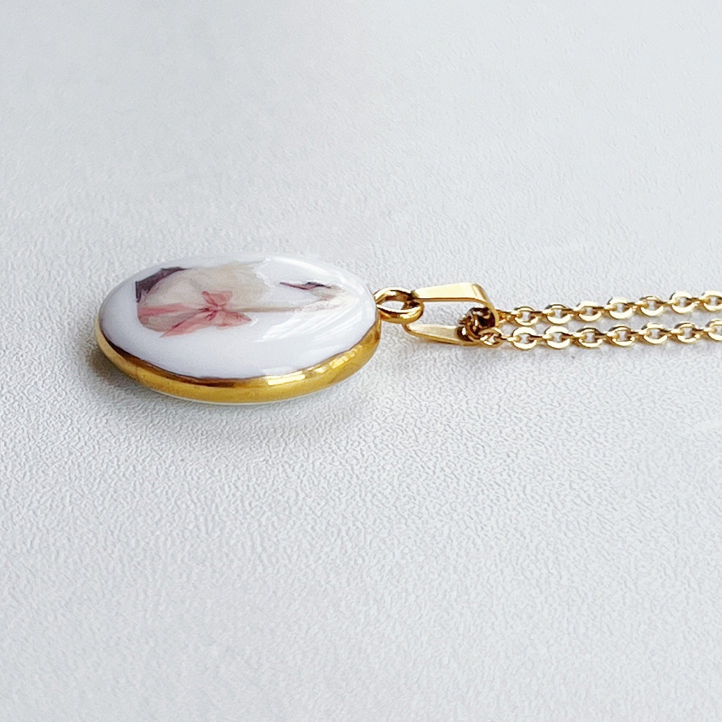 Swan with pink bow necklace