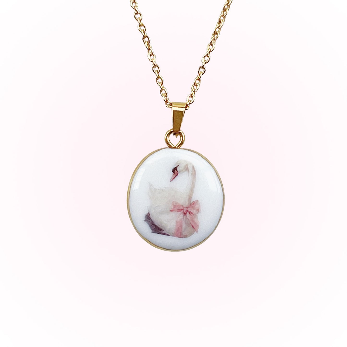 Swan with pink bow necklace