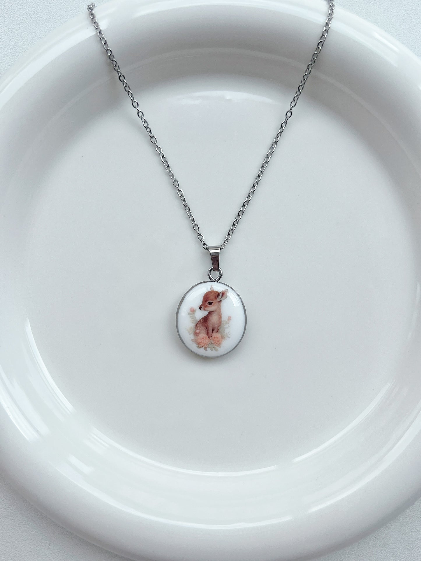 Baby deer with roses necklace