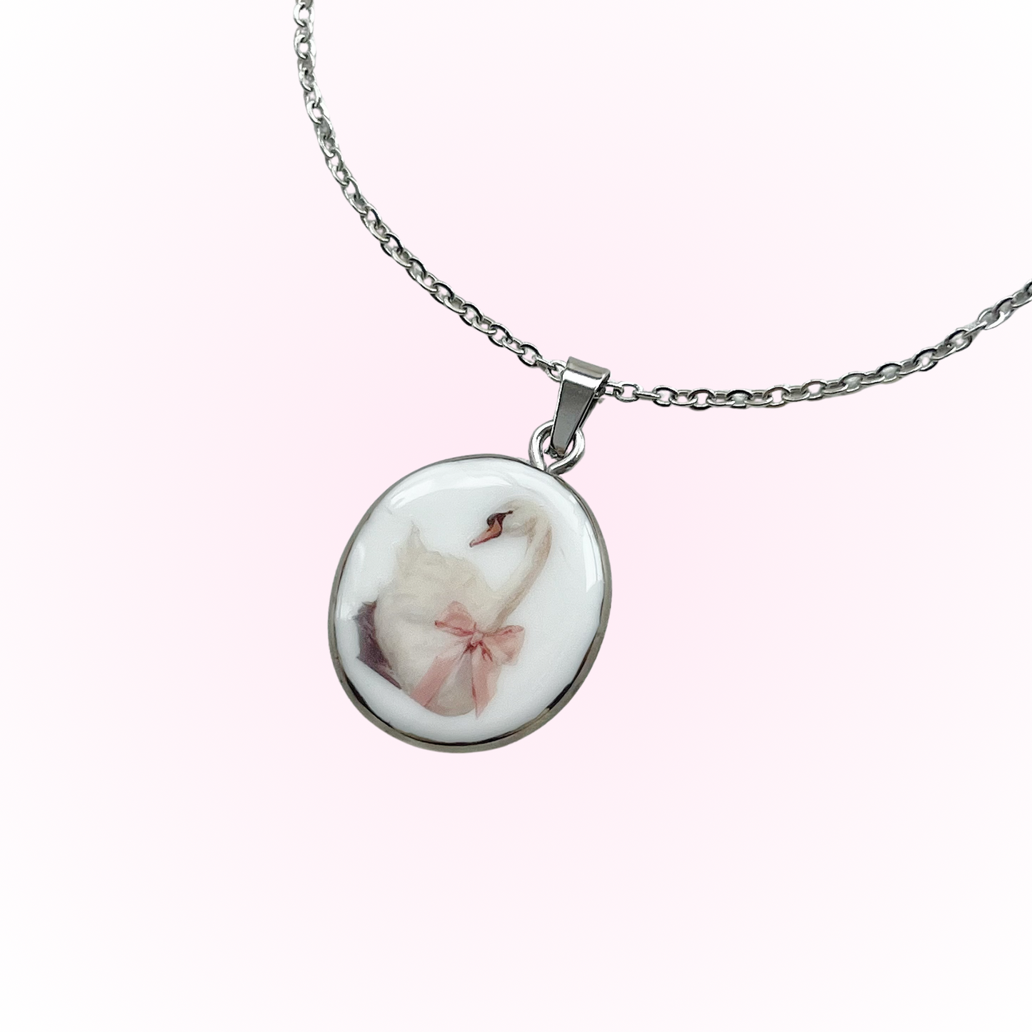 Swan with pink bow necklace
