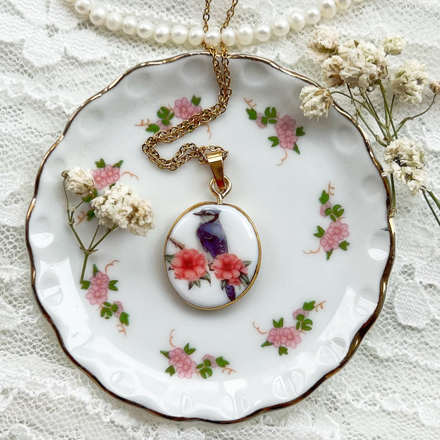 Blue jay with flowers necklace