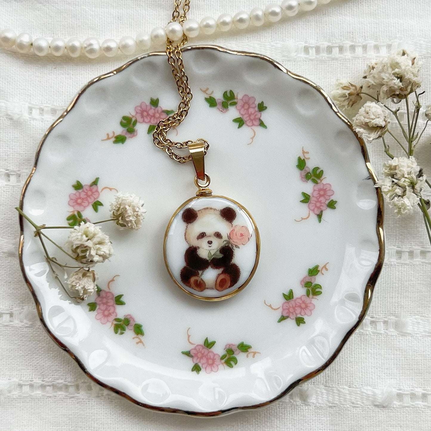 Panda with rose necklace