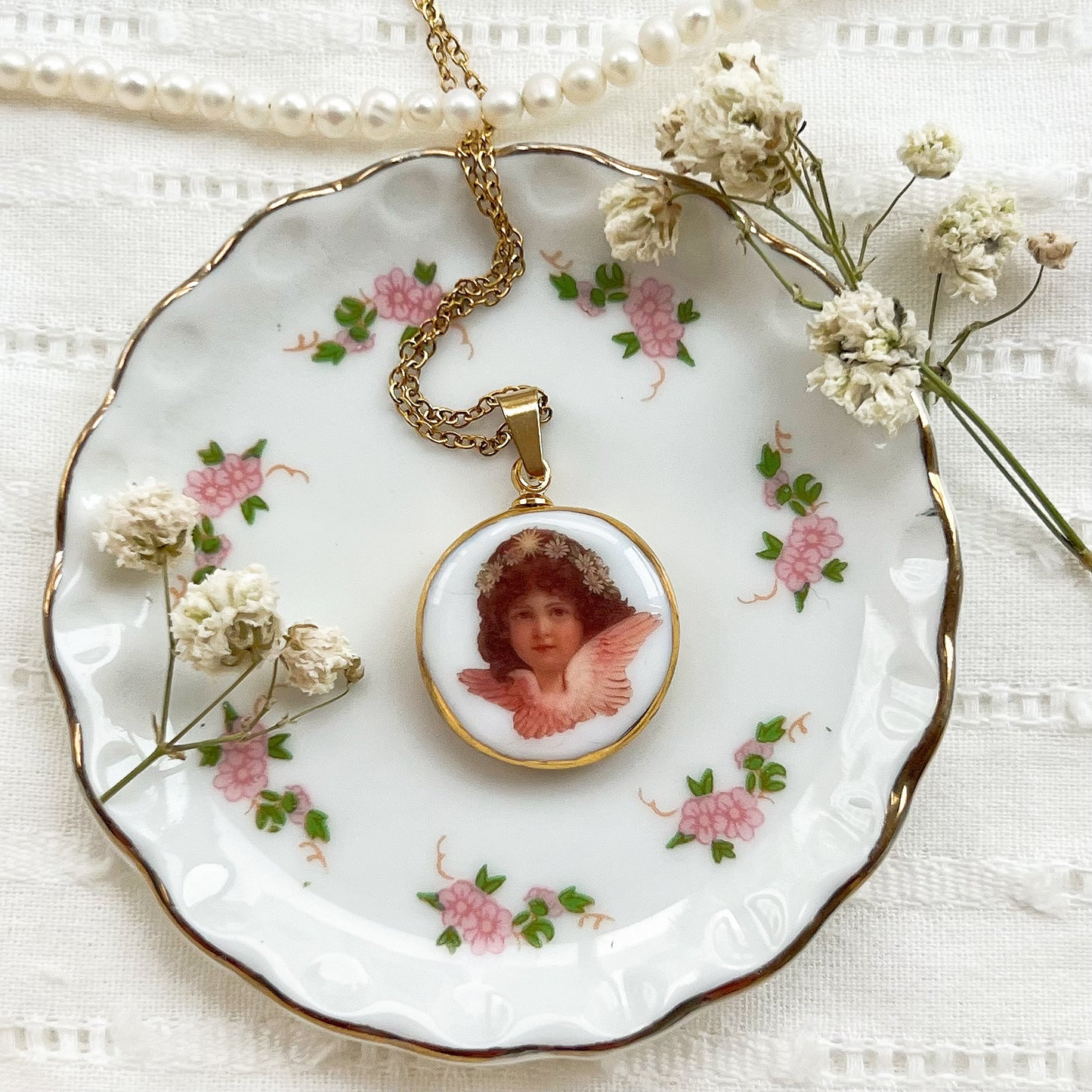 Floral angel necklace