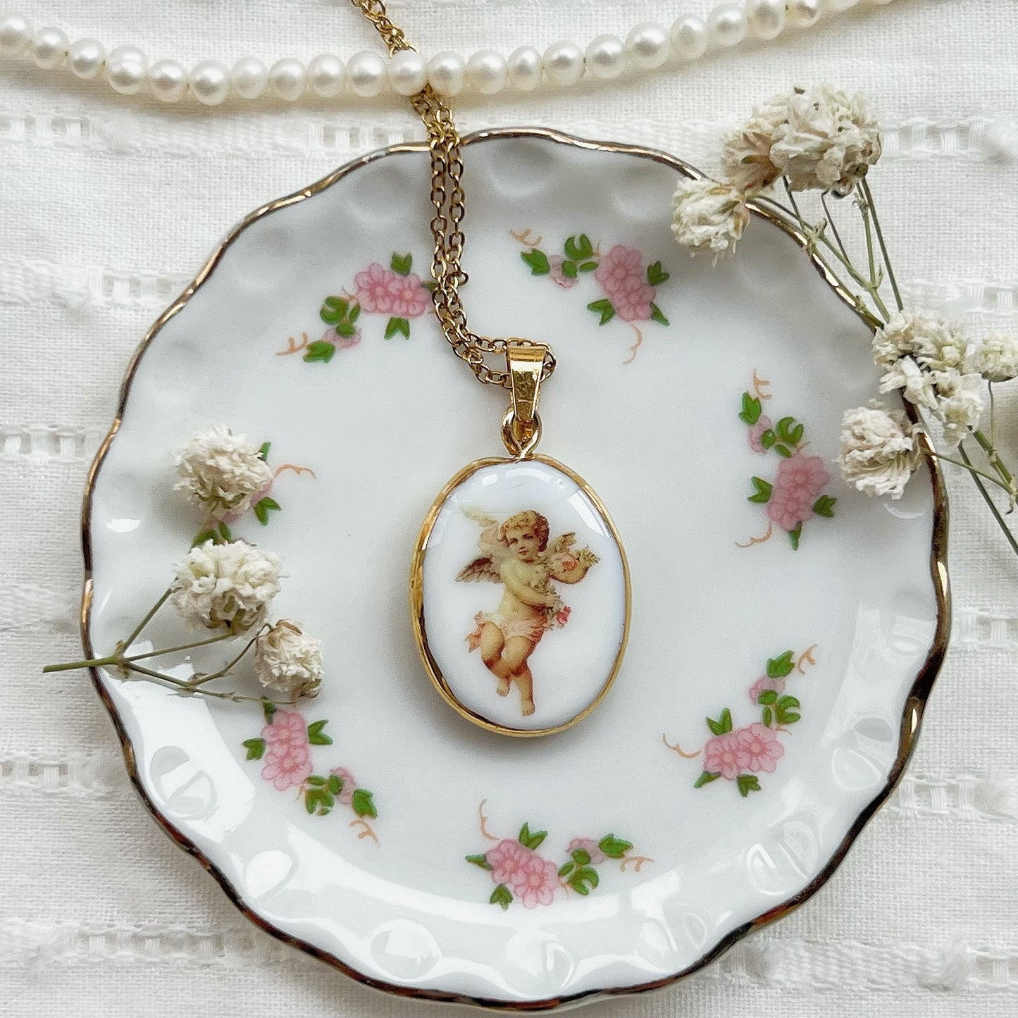 Floral angel necklace