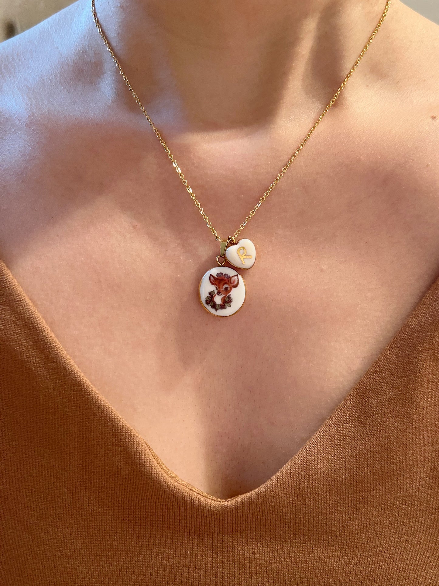 Deer with blue bird necklace
