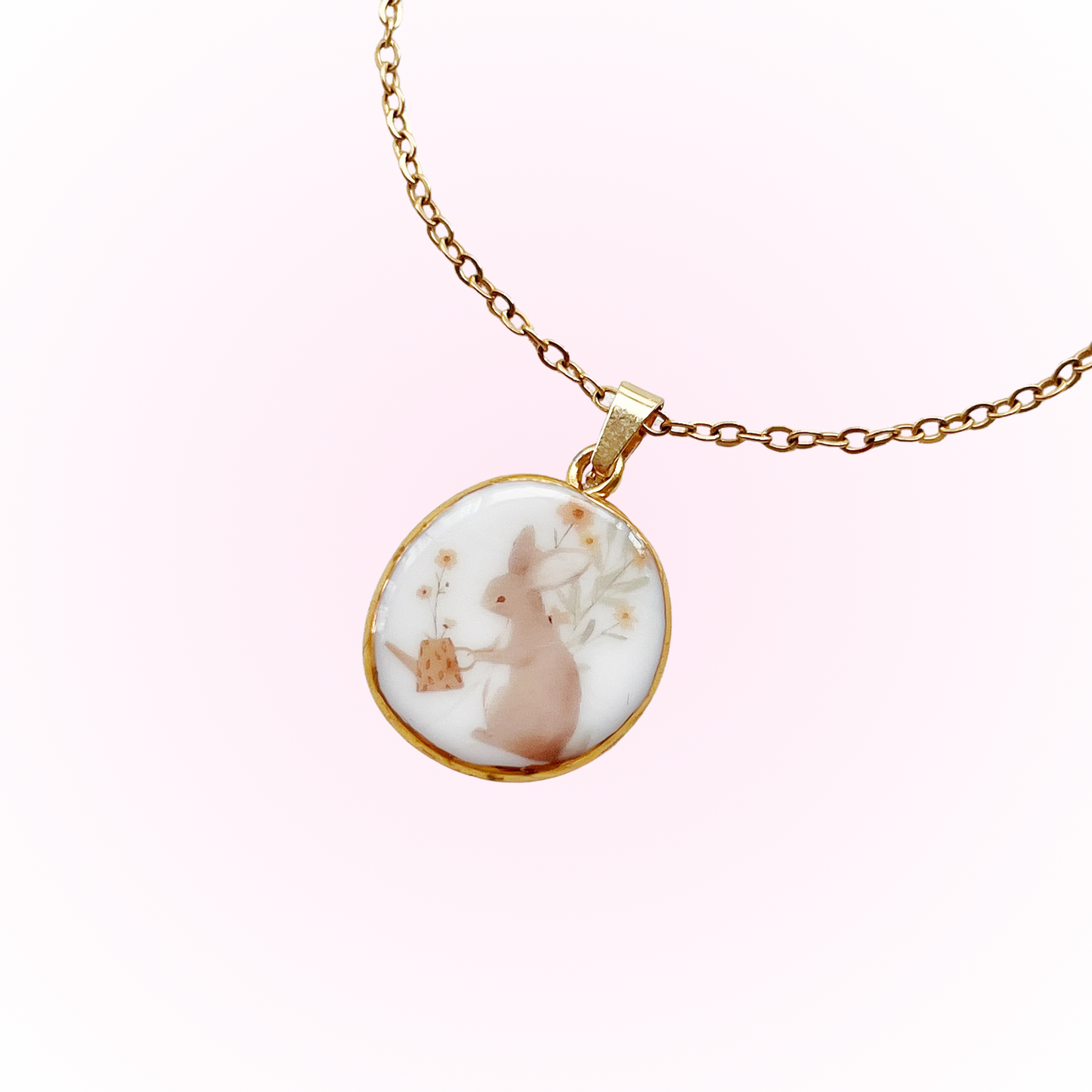 Bunny watering flowers necklace