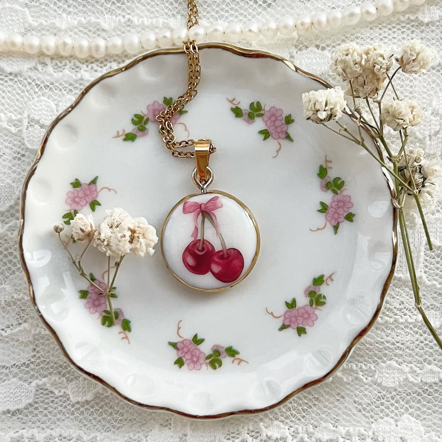 Pink bow cherry necklace