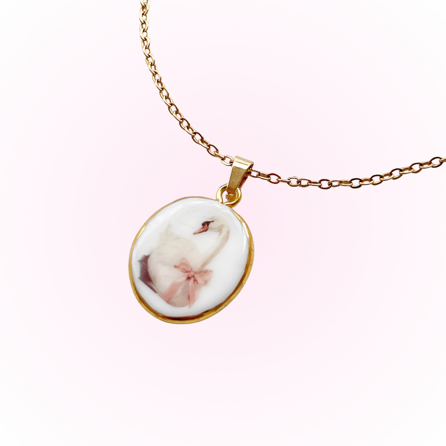 Swan with pink bow necklace