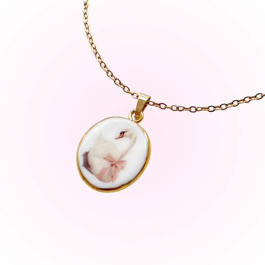 Swan with pink bow necklace