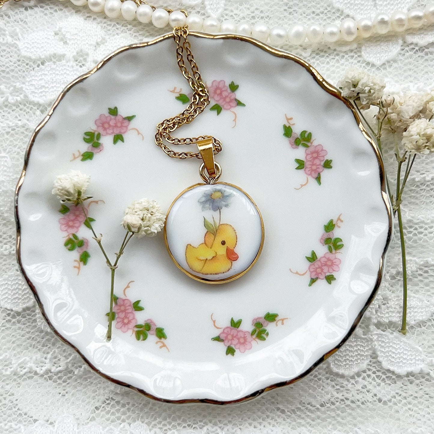 Duck with flowers necklace