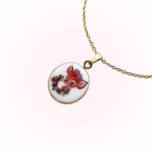 Deer with blue bird necklace